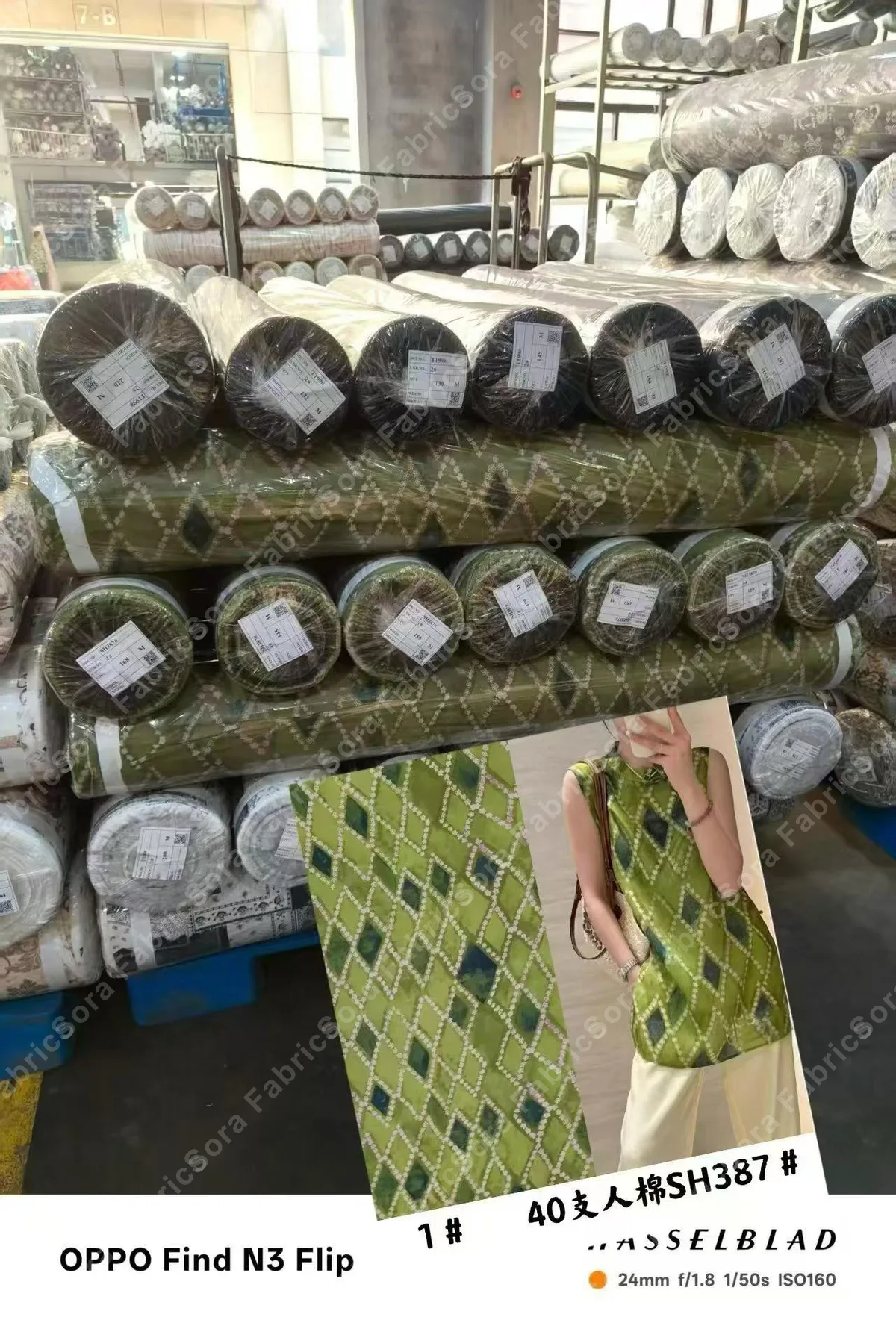 Fabric warehouse with rolls of printed fabric in stock