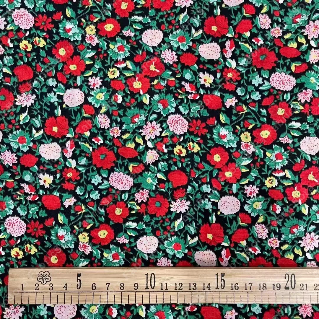 Ivory ground wildflower cotton poplin fabric