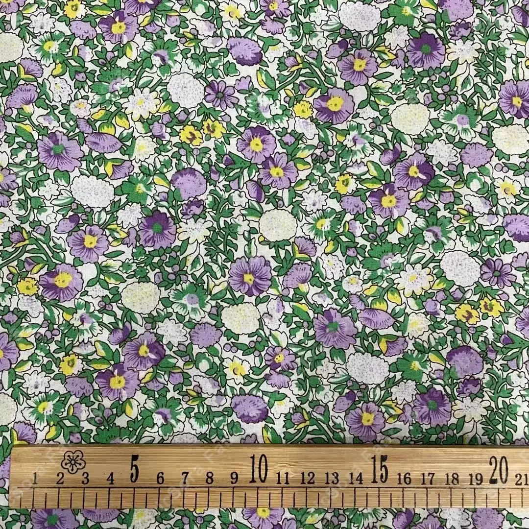 Red ground ditsy cotton poplin for prairie dresses