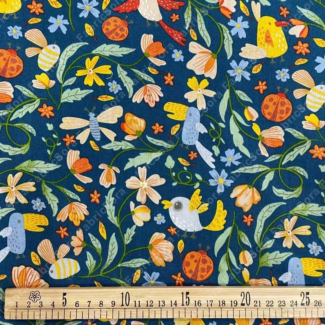 Folk-art cotton poplin in ivory ground with wildflowers