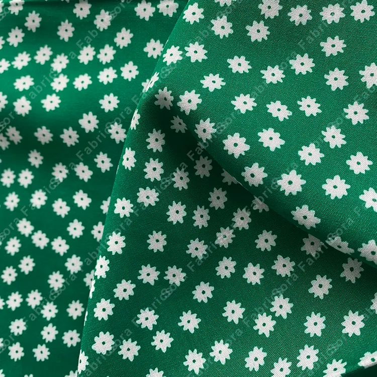 Tela rayon mini floral retro sobre fondos mostaza y verde